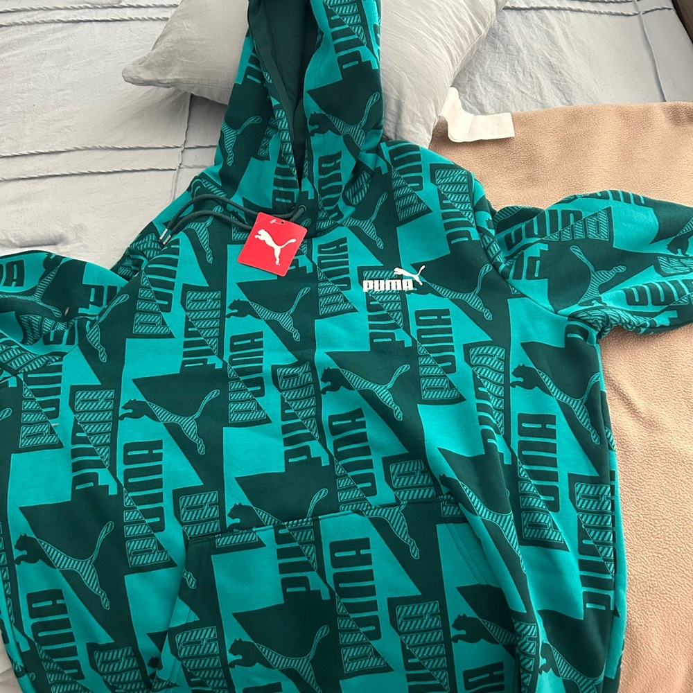Brand new Puma long sleeve hoodie. Never worn. Size Large
